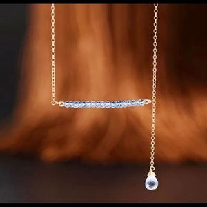 18 k gold necklace blue topaz